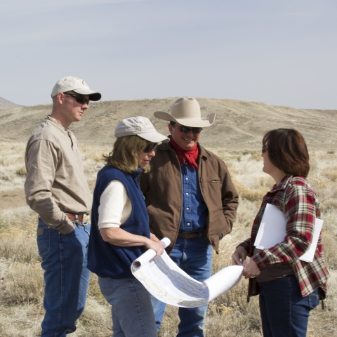 Partners for Fish and Wildlife: Landowners (Heguy Family) Meet with Partners for Fish and Wildlife Biologist Chris Jasmine and Carol Evans of the Bureau of Land Management to Review Progress 