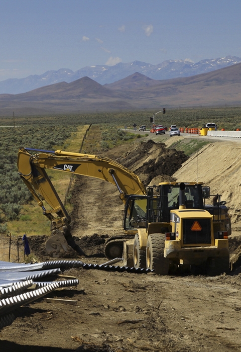 A tractor working in dirt