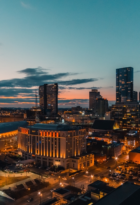 A city skyline at dusk