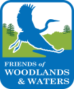 Logo for the Friends of Woodlands and Waters- shows silhouette of a great blue heron over woods and waters.