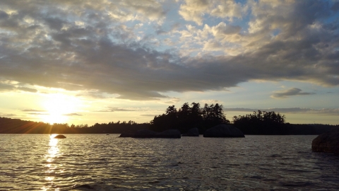 The sun begins to set above Lake Alamoosook