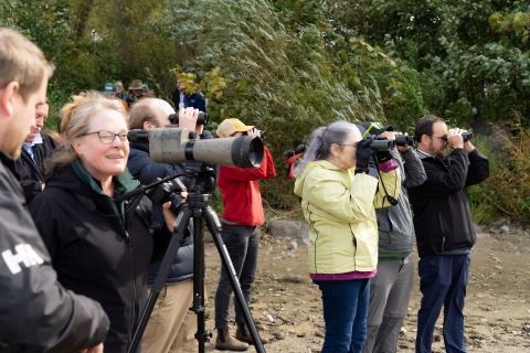 Symposium participants viewing shorebirds on a field trip to Braddock Bay Wildlife Management Area on Lake. Ontario in New York