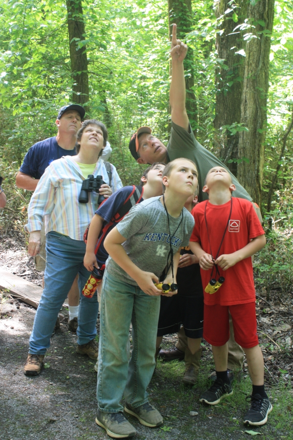 An image of a family birding.