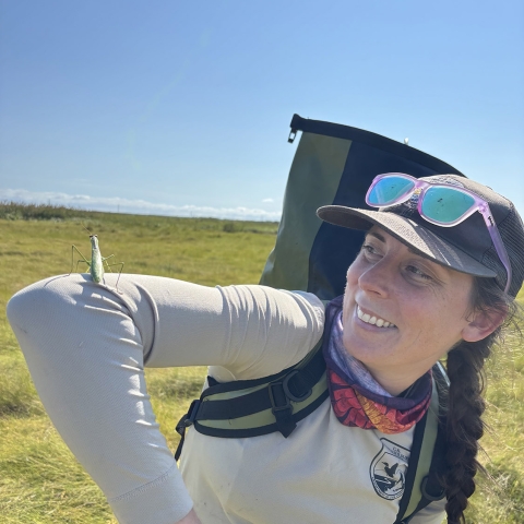 Kaity Ripple with praying mantis posing on her arm