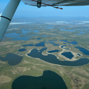 aerial view of wetlands and snow on the landscape