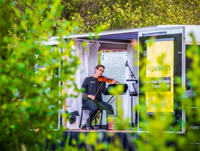 A pianist performs with a string quartet at a national wildlife refuge