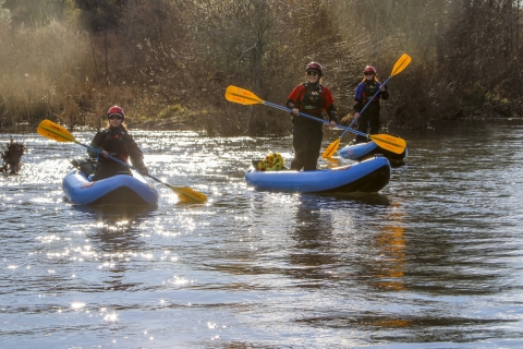 three people kayaking