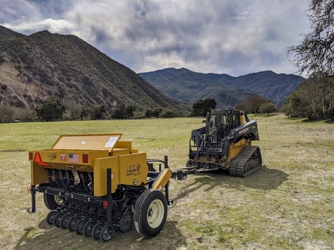 A drill seeder and tractor