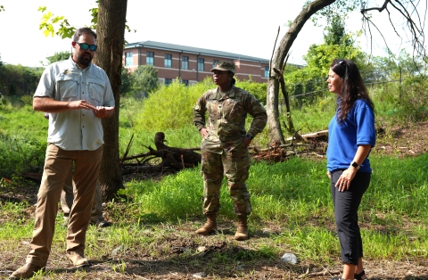 biologist s and colonel gore at stream resoration