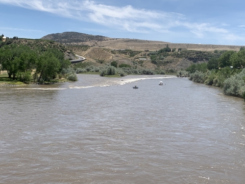 A river with two boaters