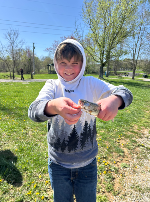 Kida holding trout
