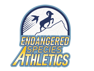 logo that shows a silhouette of a bighorn sheet and bird going up the side of a mountain with the text "Endangered Species Athletics"